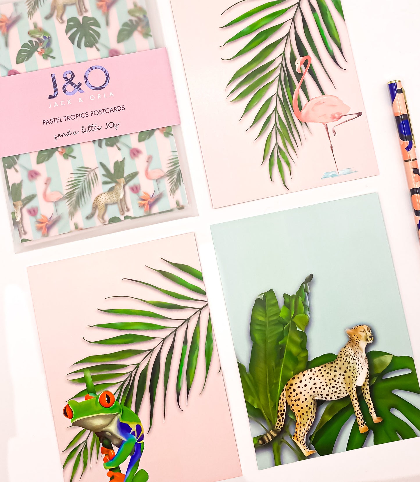 Close-up of pastel tropics postcards by Jack & Orla